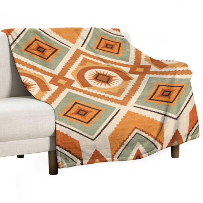 Jeté en flanelle de luxe à motif géométrique, couverture douce et chaude pour le canapé-lit du salon