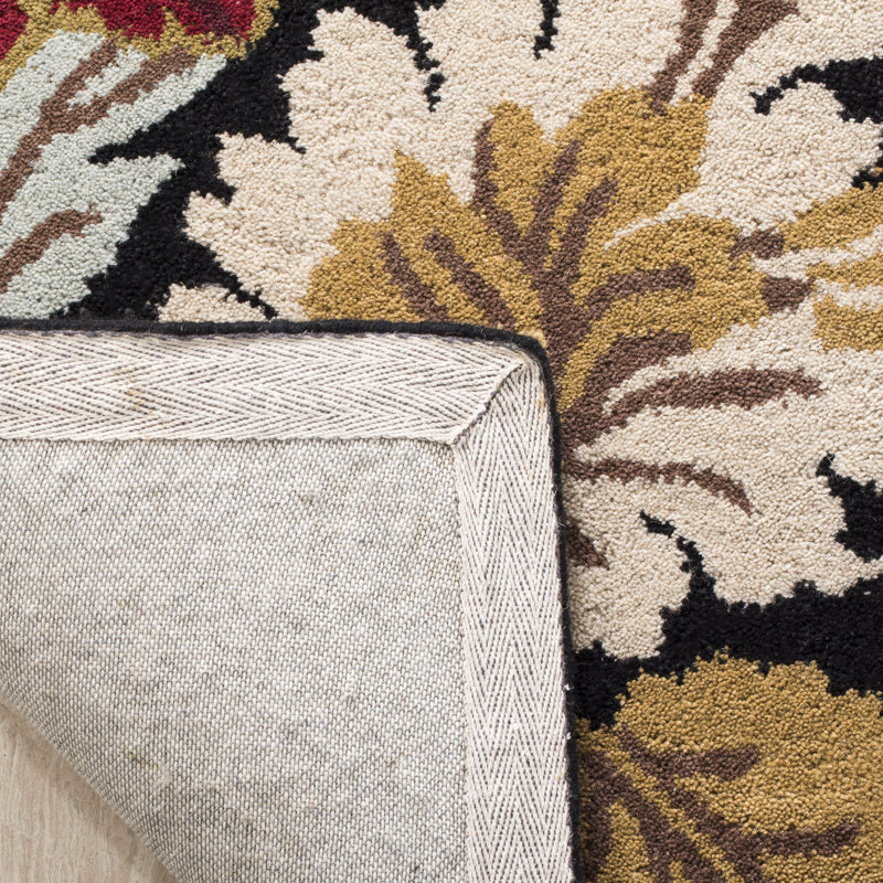 Emrick Hand Hooked Wool/Cotton/Latex Floral Rug in Black, Round 6'
