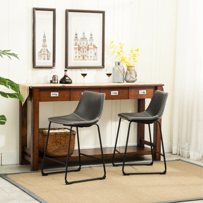 Vintage, 2 tabourets de comptoir en cuir PU gris antique Chaises en métal fabriquées à la main avec sièges en plastique massif. Cadre en fer noir. Dimensions: l 18,5 po x P 21,5 po x H 34,5 po. Siège: H 15 po x P 24,5 po