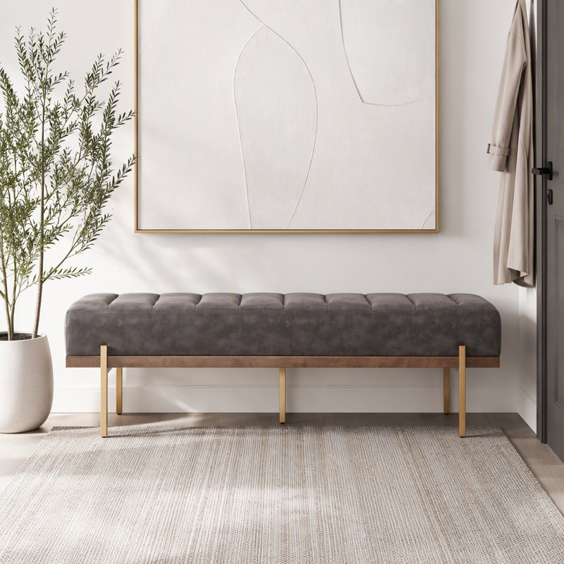 Banquette rembourrée capitonnée avec pieds dorés