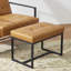 Fauteuil et repose-pieds en cuir Buren-101040977