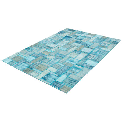 Tapis décoratif turquoise en laine noué à la main de conception unique 6 pi 11 po x 9 pi 9 po Bethenia