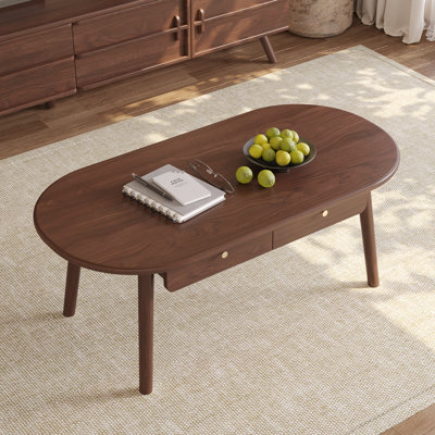 Table basse ovale en bois de noyer avec tiroirs