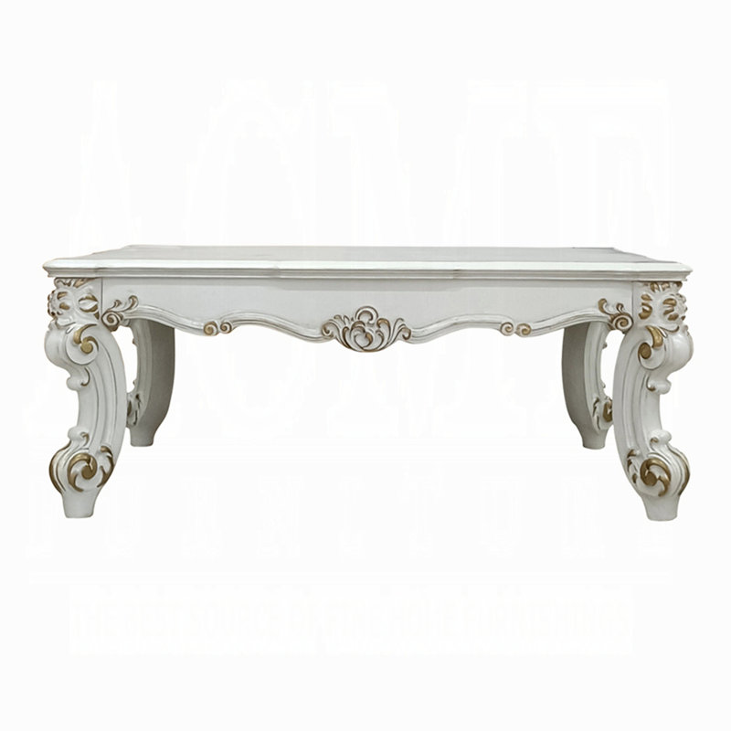 Table basse avec pieds à volutes