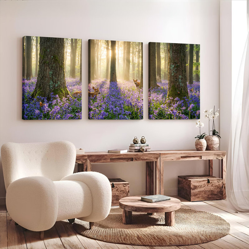 Ensemble de 3 tableaux sur toile tendue représentant un lever de soleil en forêt avec des jacinthes des bois et des cerfs