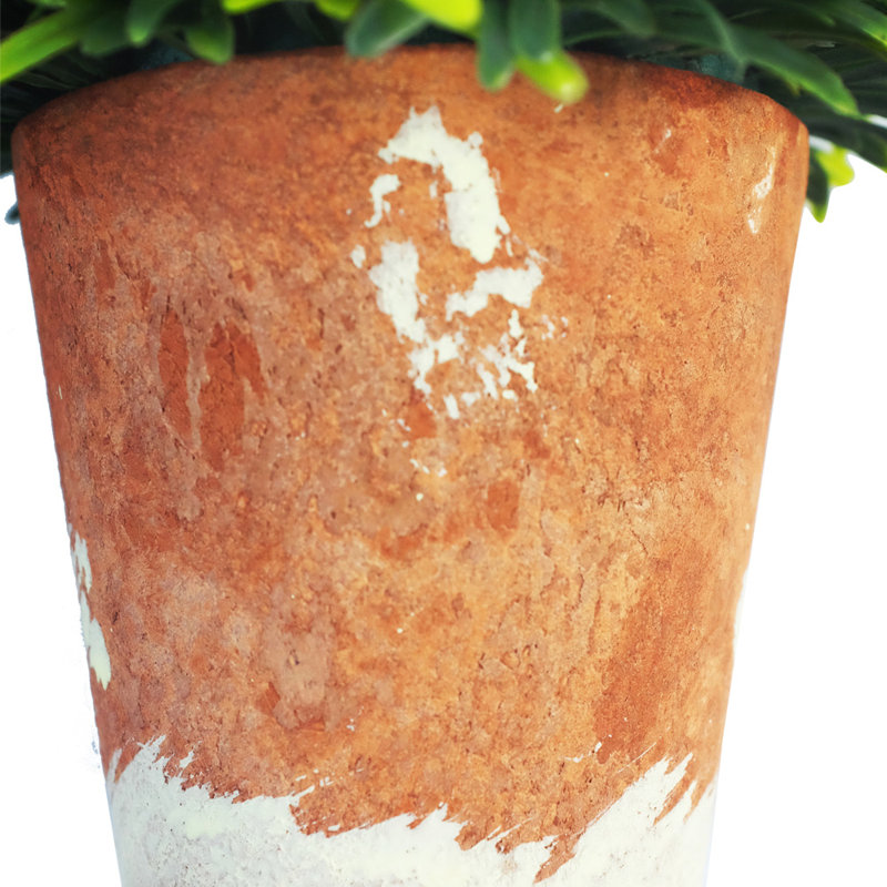 Plante artificielle en pot rustique