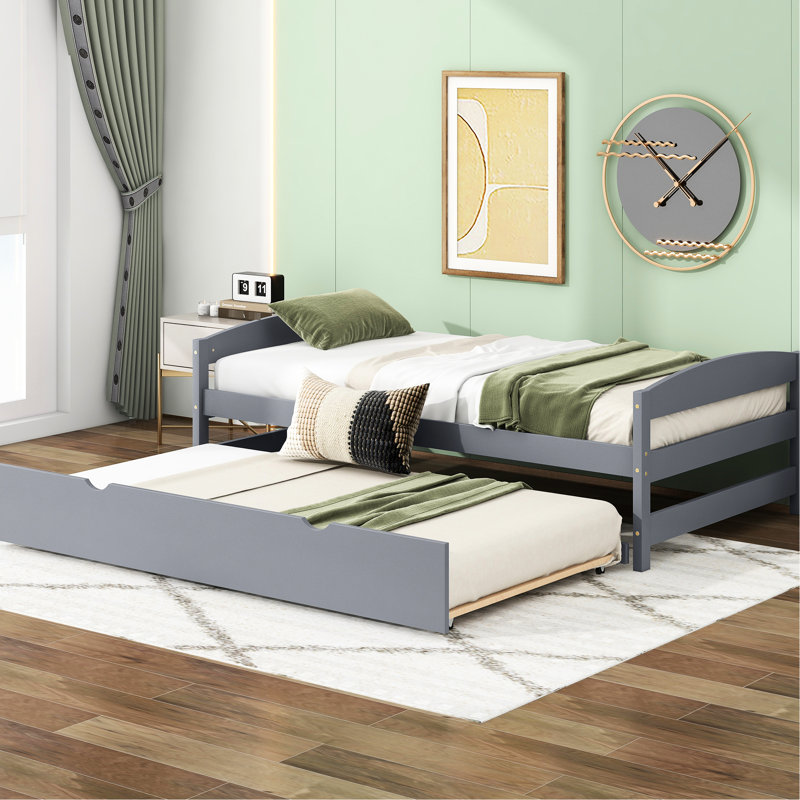 Lit plateforme simple avec lit gigogne gris - création d'ambiance fonctionnelle dans la chambre à coucher