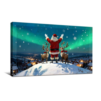 Noël père Noël avec renne sous les aurores boréales