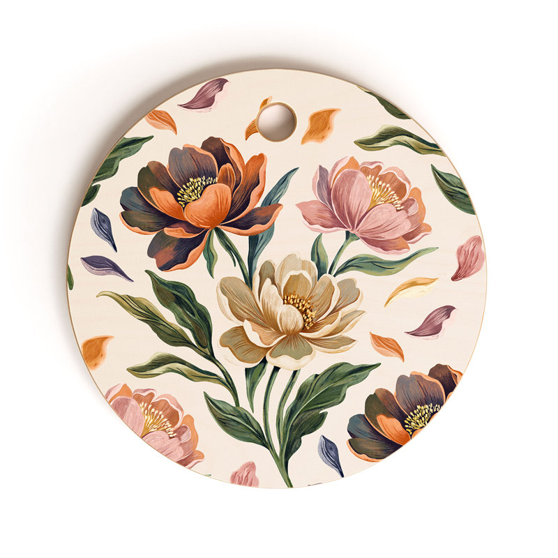 Planche à découper ronde Marta Barragan Camarasa, peinte à la main, avec un motif de pivoines.