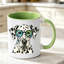 A reusable ceramic coffee cup with a spotted dog print, suitable as a birthday gift, Thanksgiving gift and Christmas present.