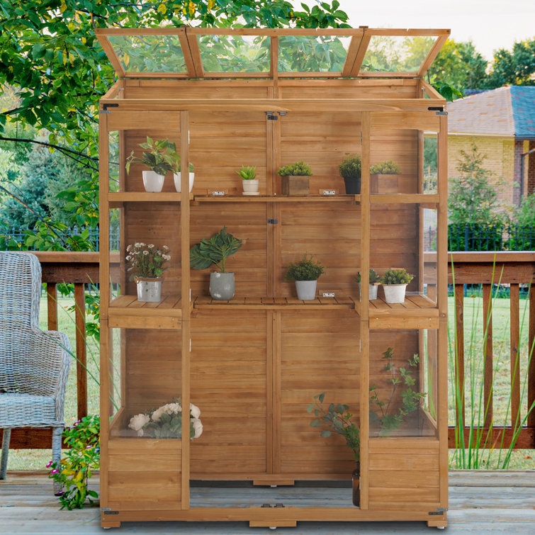 57.9" W x 28.5" D Wooden Greenhouse with Openable Roof and Lockable Door