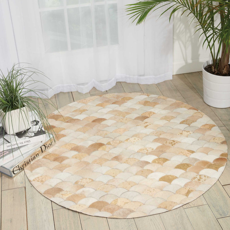 Tapis de zone beige rond géométrique vache Montecello