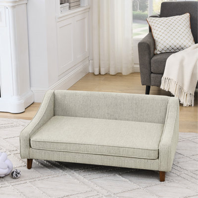 Canapé-lit surélevé durable et confortable avec accoudoirs irréguliers de conception moderne, idéal pour les chiens de taille moyenne et grande