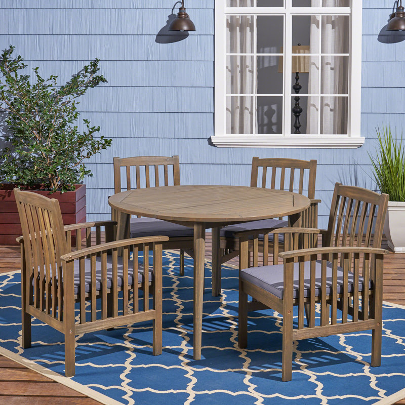 Tinnin 4 - Person Acacia Wood Patio Dining Set with Round Table , Cushions Included, Purple