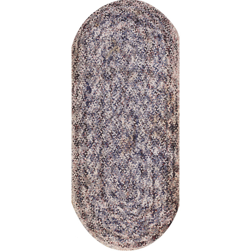 Tapis multicolore en laine tressé antique