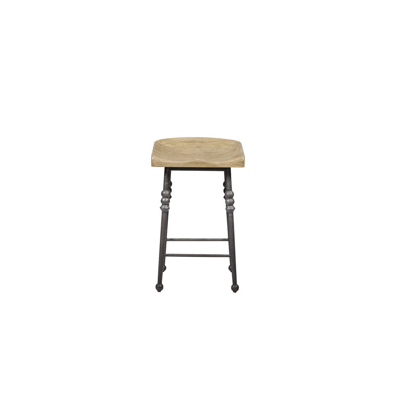 Tabouret de bar Cashew Saddle, hauteur de comptoir, piètement en métal industriel et placage, idéal pour les cuisines, bars et salles à manger, avec tables colorées.