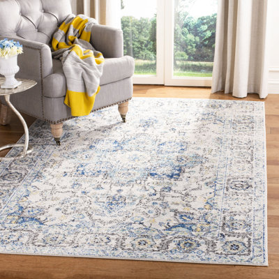 Christa Oriental Turquoise/Ivory Area Rug