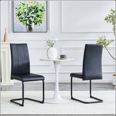 Chaise de salle à manger rembourrée en polyuréthane noir avec pieds thermolaqués noirs - ensemble de 2