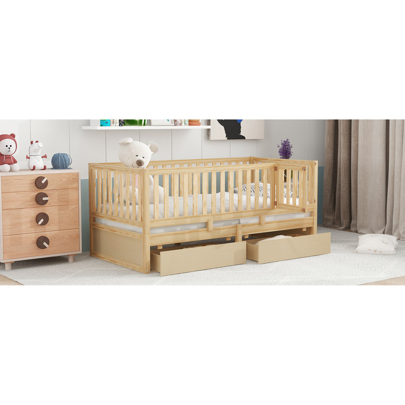 Lit de jour simple en bois naturel avec garde-corps et tiroirs de rangement, dans le lit au sol, idéal pour les chambres d'amis