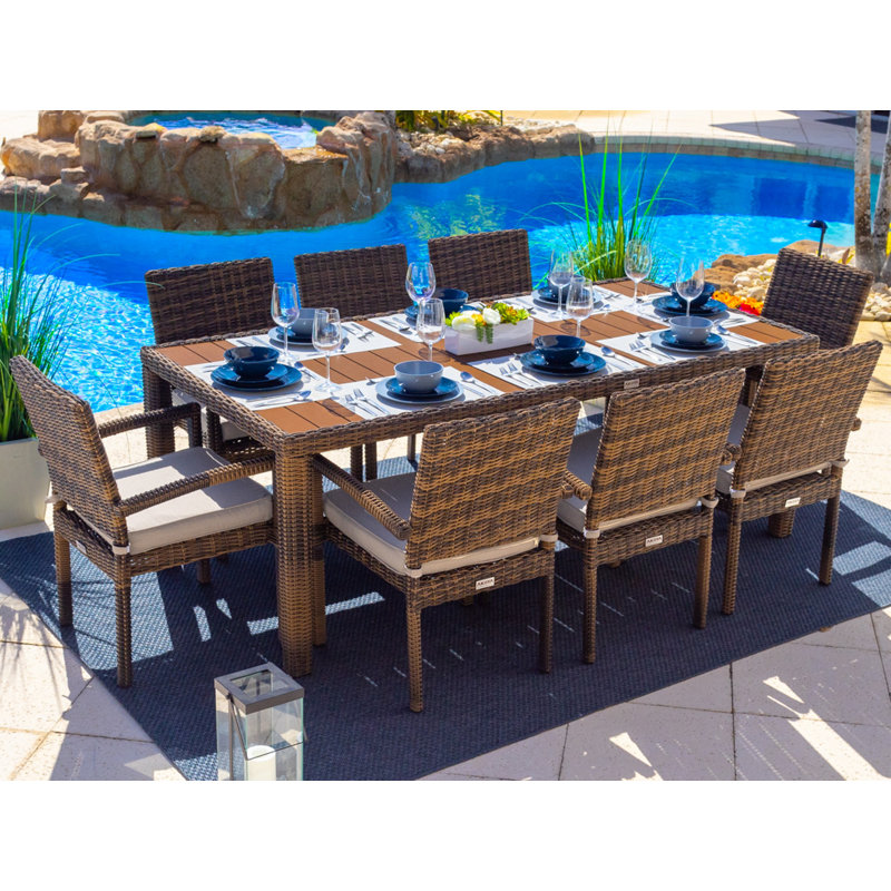 Tuscany Rectangular 8 - Person Rectangular Wicker Dining Set with Cushions, Canvas Silver Grey Sunbrella® Canvas