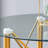 Transparent Round Tempered Glass Table with Adjustable Golden Metal Legs, Telescopic Support, Suction Cup Stability, and Foldable Space-Saving Design.