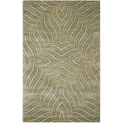 Tapis bleu / ivoire en laine touffeté à la main Chiara