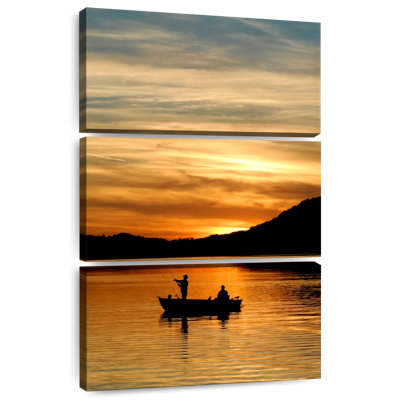 Silhouette de pêche au coucher du soleil de Senne