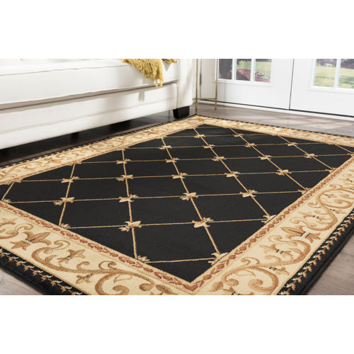 Astoria Grand Clarence Performance Black/Gold Rug & Reviews | Wayfair