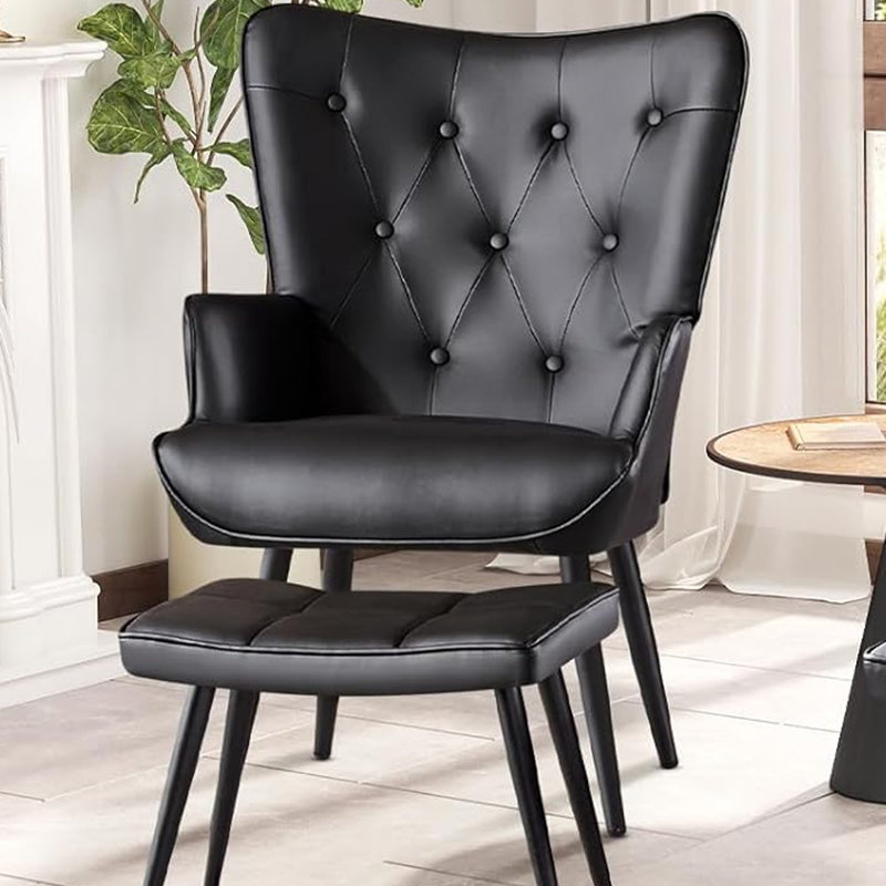Fauteuil à oreilles et repose-pieds capitonnés, Noir