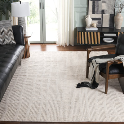 Myrka Hand Knotted Wool/Cotton Solid Color Rug in Ivory