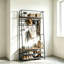 Portemanteau autoportant 4 en 1 pour vestibule, portemanteau avec tringle, tablettes de rangement pour chaussures et banc rembourré, panneau de particules avec structure en métal noir robuste-1620577086