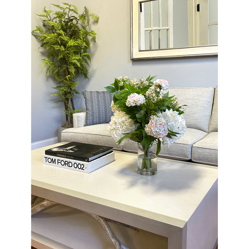 Hydrangeas and Viburnum Arranged in a Glass Vase
