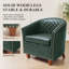 Fauteuil demi-tonneau en cuir moderne avec dossier capitonné à losanges et garniture cloutée-395551916