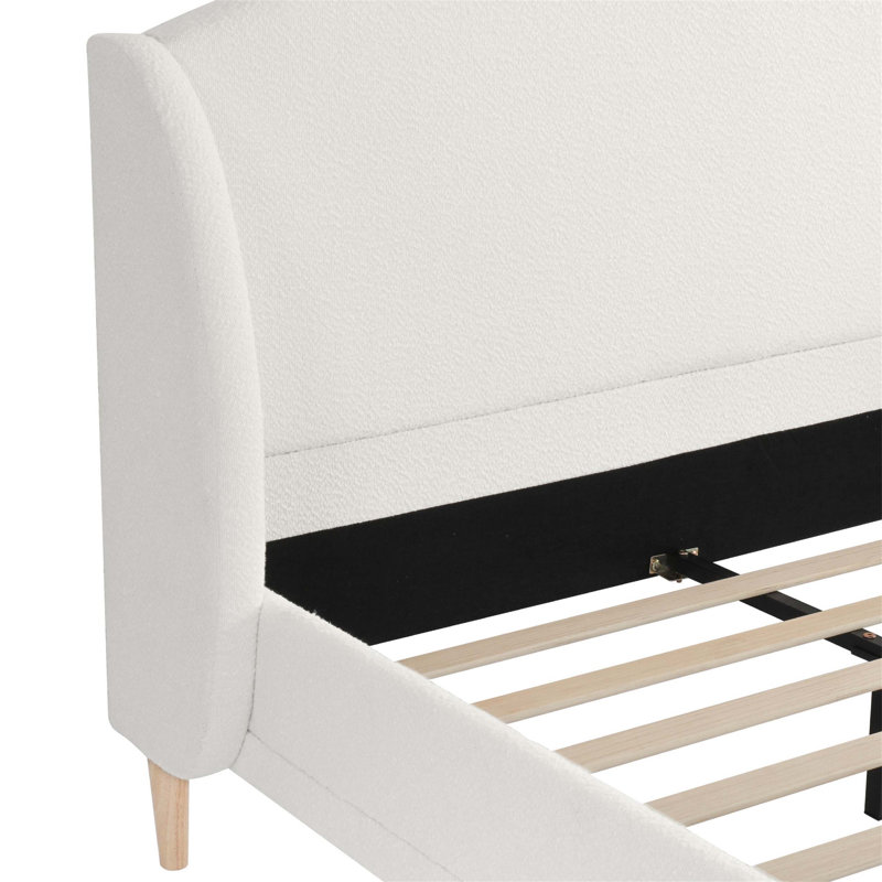 Lit plateforme tapissier avec tissu Boucle et tête de lit à oreilles, coins arrondis pour une chambre confortable et élégante