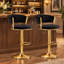 Tabouret de bar pivotant à 360° avec assise de 42 cm de large, hauteur réglable, revêtement en velours, structure en métal doré et repose-pieds.-1282993188