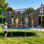 Tranpoline 14FT pour enfants avec filet de sécurité Tranpoline récréative pour adultes Approuvé par l'ASTM Tranpoline extérieure pour la cour arrière avec panier de basketball