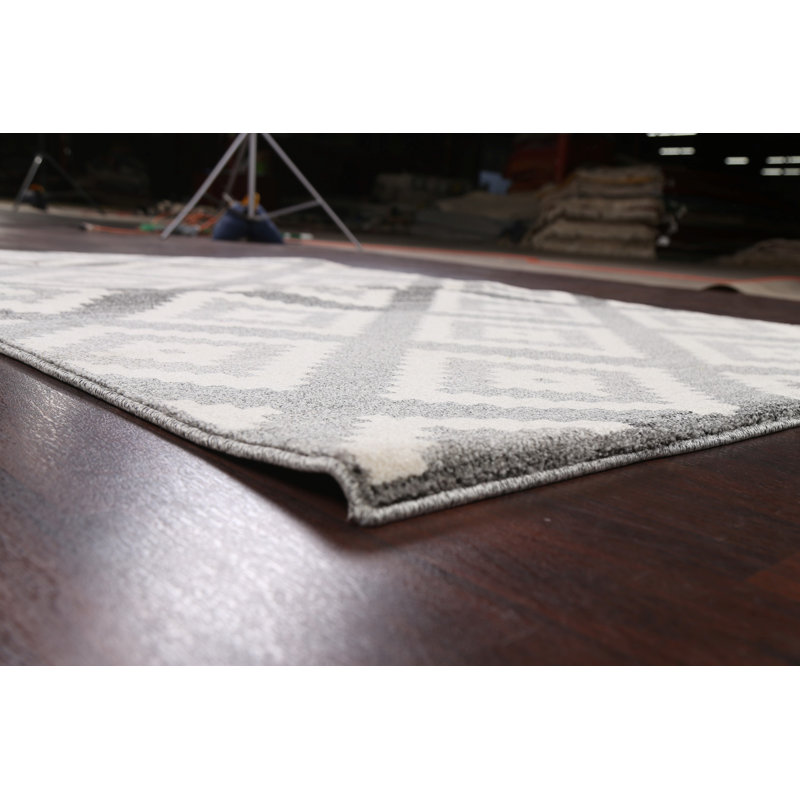 Tapis géométrique gris