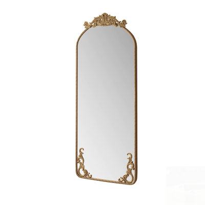 Miroir mural arqué pleine longueur avec applique sculptée vintage, bronze, idéal pour une décoration intérieure rétro.