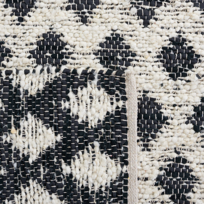 Tapis à motif géométrique en laine et en cuir noir / beige Jeananne, Rectangle 5 pi x 8 pi
