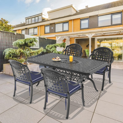4-Person 66.93"L Rectangular Patio Dining Set with Umbrella Hole, 4 Stackable Chairs with Blue Cushions