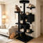 Arbre à chat gris foncé (taille 54), un poteau à griffes et des jouets pour chats, permettant aux chats de jouer et de se reposer en même temps.