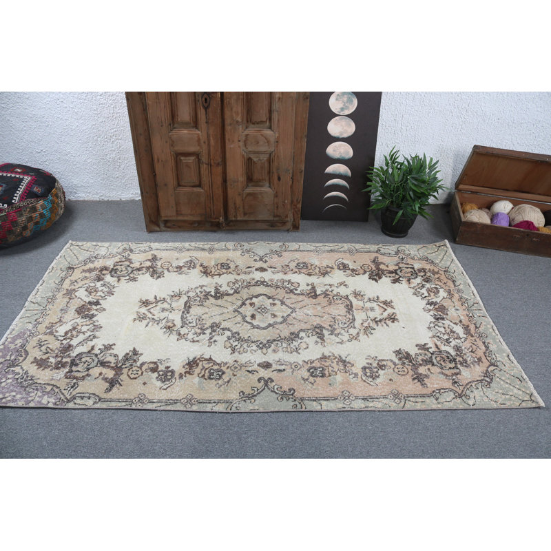 Vintage Turkish Floral Motif Area Rug Handwoven with Elegant Beige and Soft Pastel Colours