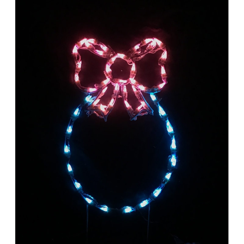 Œuf peint avec nœud lumineux