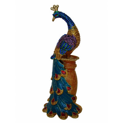Figurine paon sur un piédestal