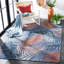 Tapis intérieur / extérieur à motif floral bleu / rouille Afeez-601263487