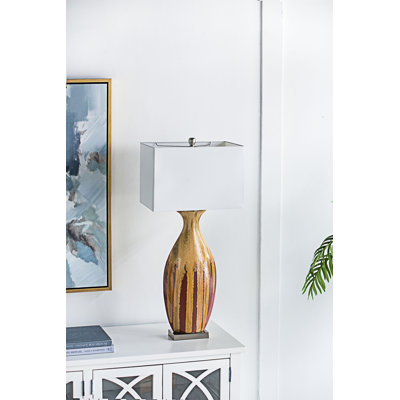 Ceramic Table Lamp With Multicolored Drip Glaze Finish, Warm Ivory Shade, And Elegant Curved Design