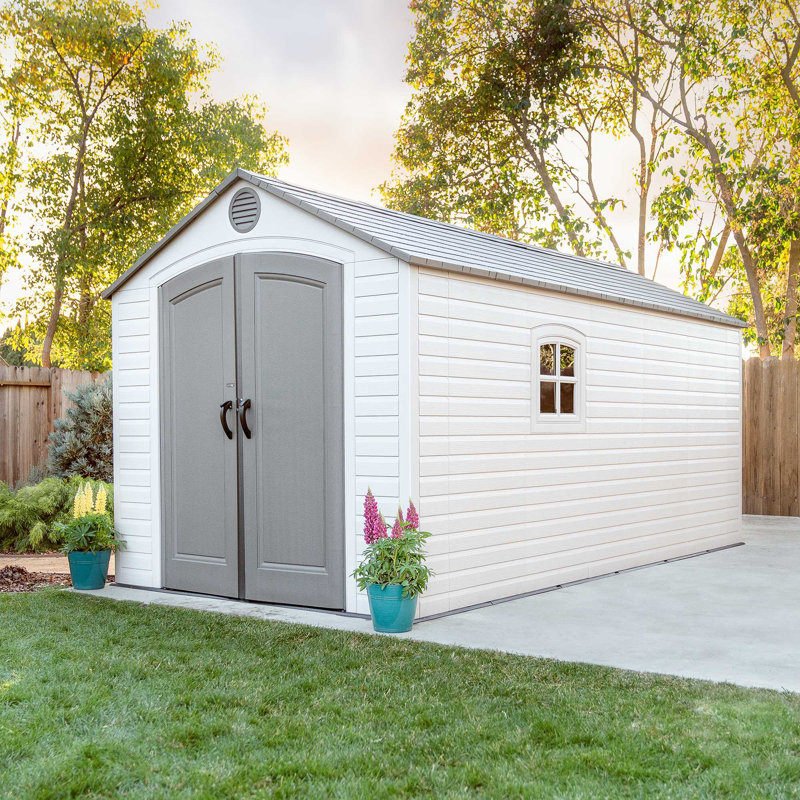Large Beige and Brown Polyethylene Storage Shed with Windows and Shelving
