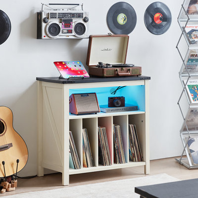 Grand meuble pour platine vinyle avec station de recharge, éclairage DEL et armoire de rangement pour 230 disques.