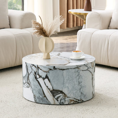 Table basse cylindrique simple texturée en marbre blanc