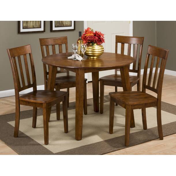 Lark Manor Chaffin Extendable Round Solid Wood Dining Table & Reviews ...